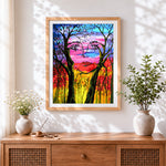 Finished hidden face tree silhouette cross stitch artwork displayed