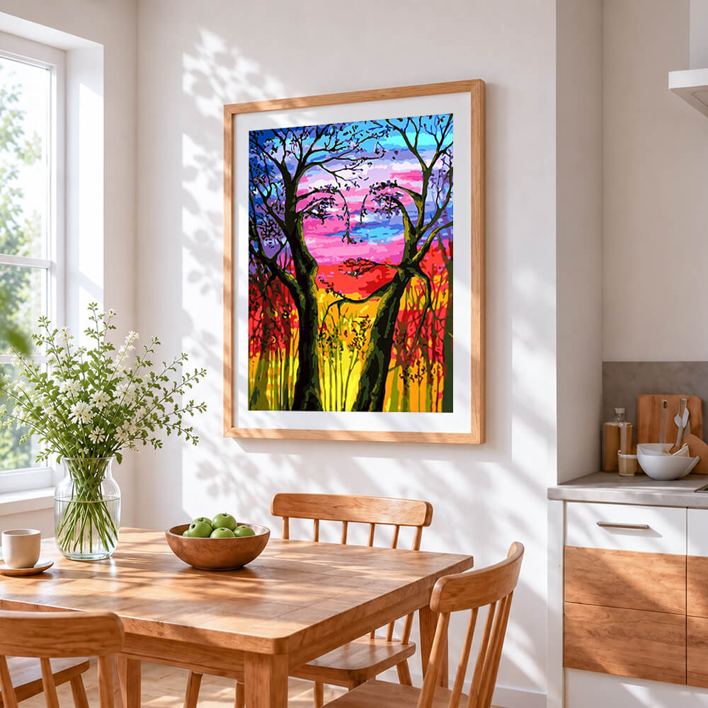 Hidden face tree silhouette cross stitch artwork displayed on wall as home decor