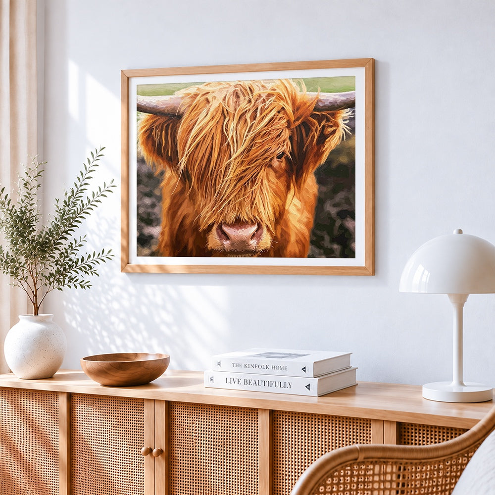 Highland cow close up paint by numbers artwork displayed on wall as home decor