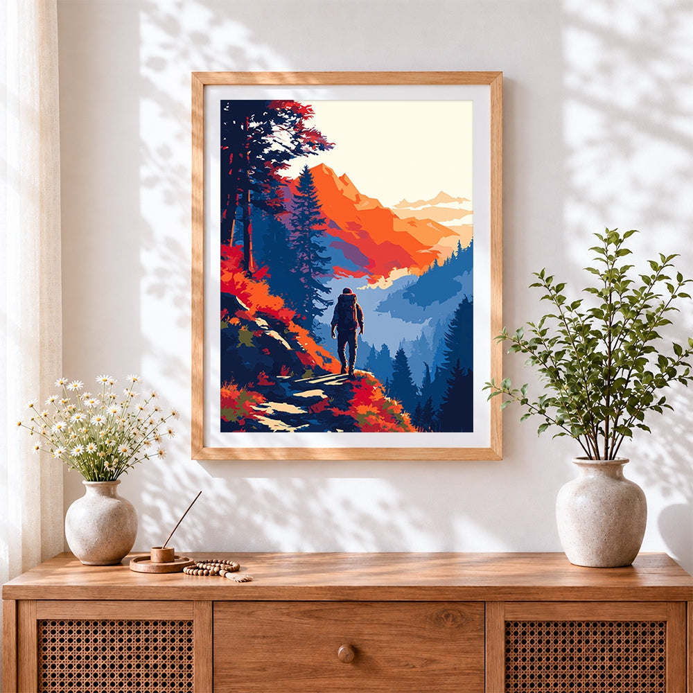 Finished hiker in autumn mountains cross stitch artwork displayed