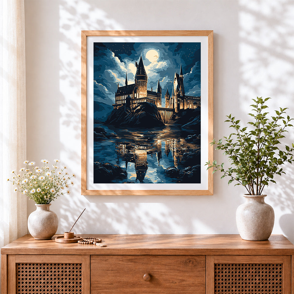 Finished hogwarts castle by moonlight cross stitch artwork displayed