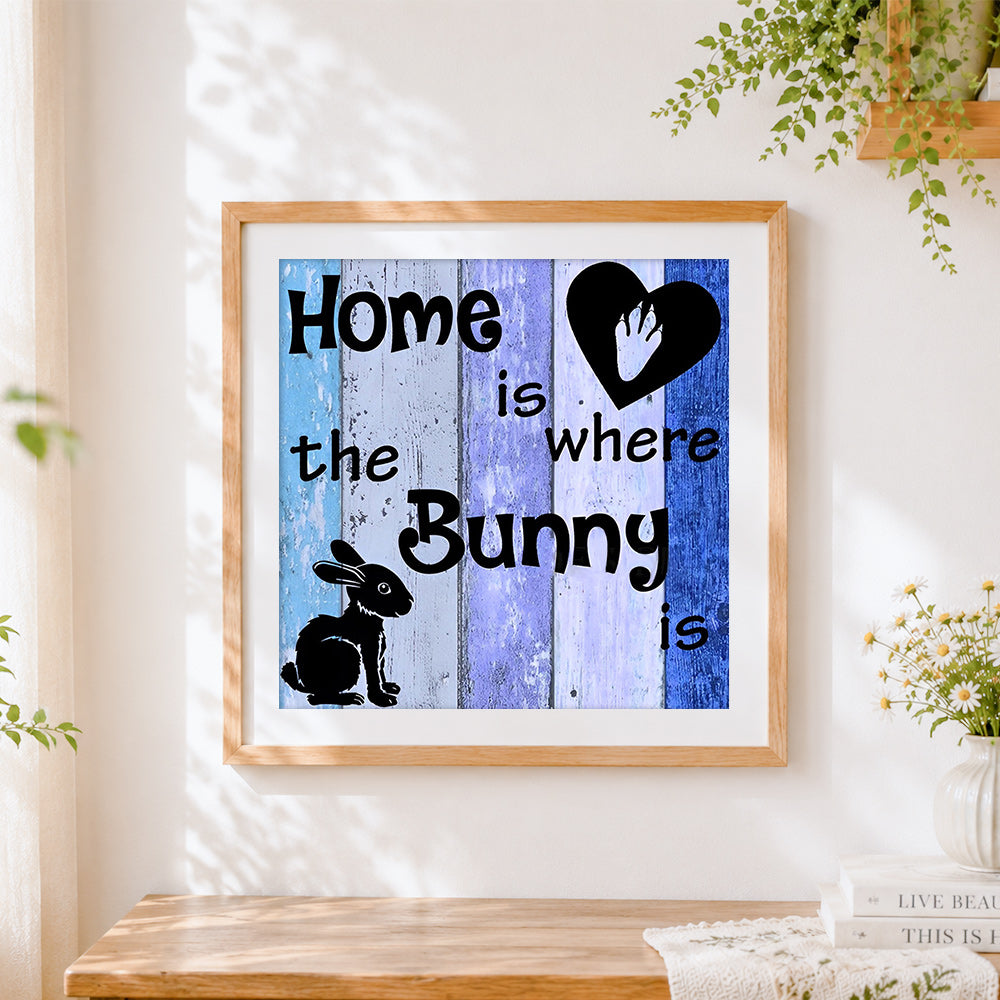 Finished home is where the bunny is cross stitch artwork displayed