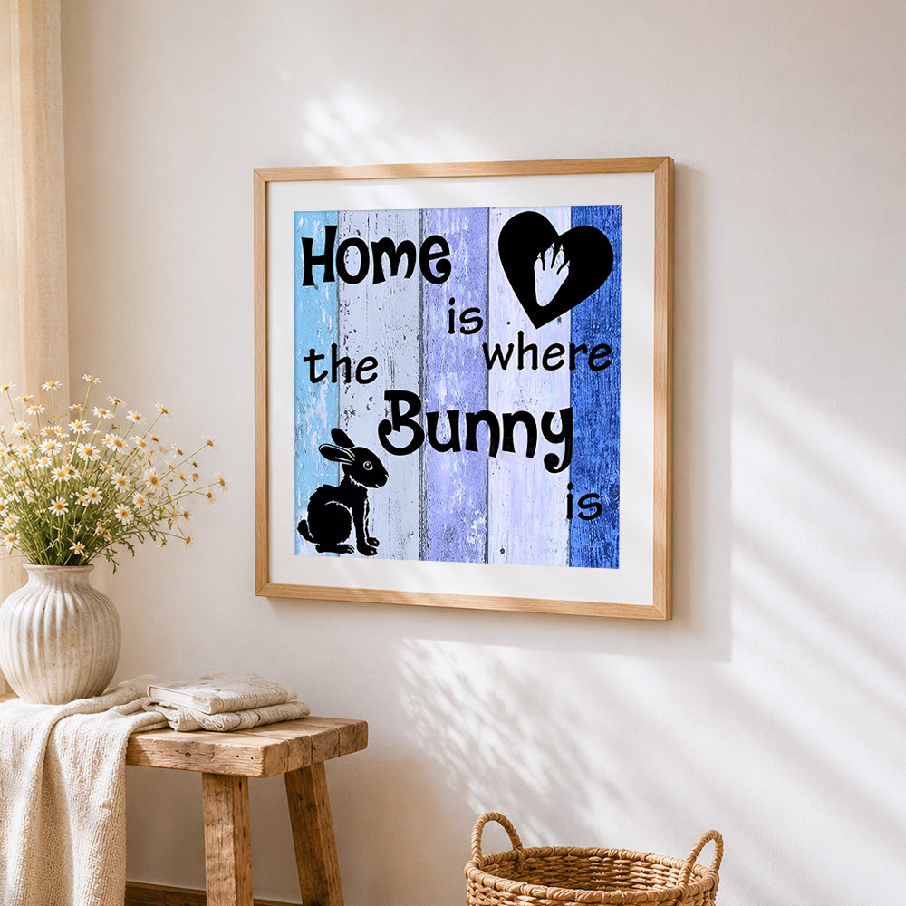 Home is where the bunny is cross stitch artwork displayed on wall as home decor