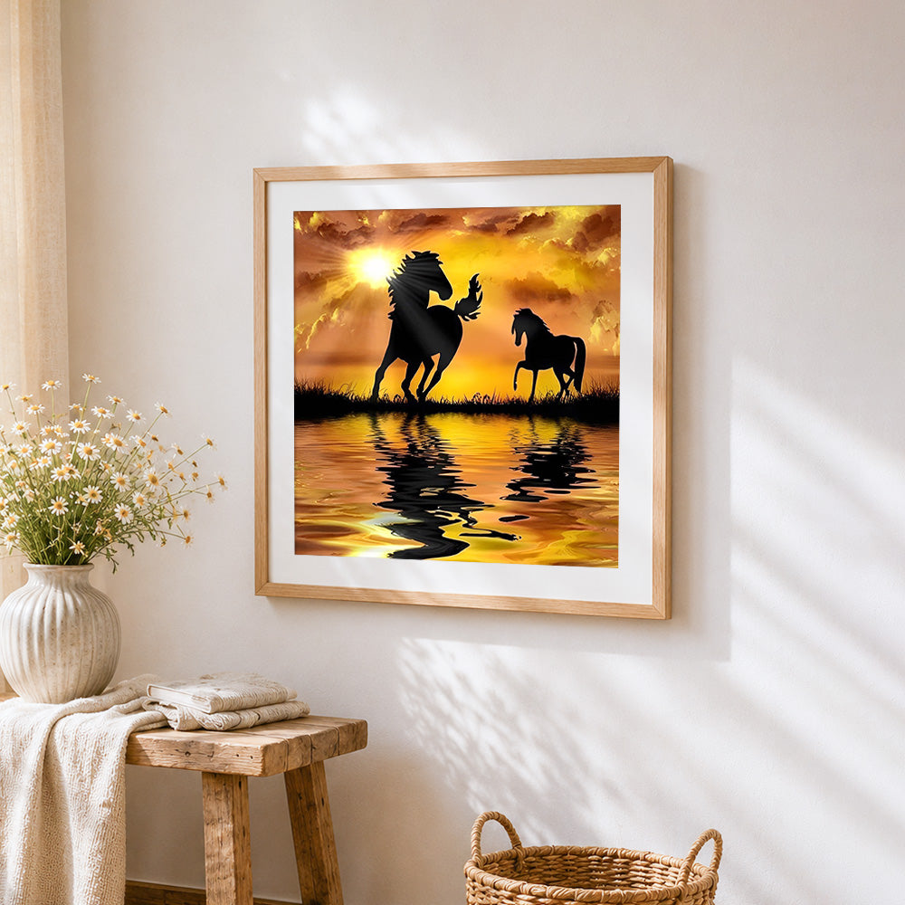 Horse silhouettes at sunset cross stitch artwork displayed on wall as home decor