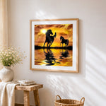 Horse silhouettes at sunset cross stitch artwork displayed on wall as home decor