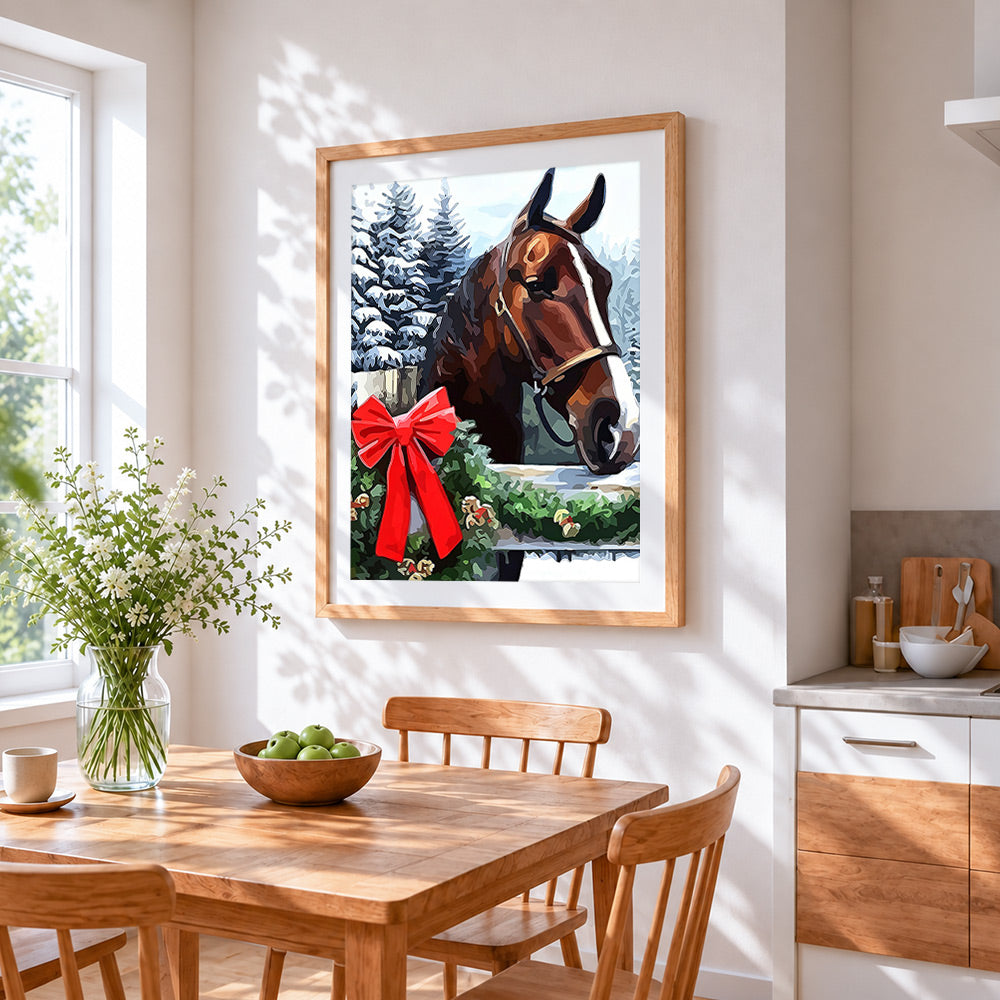 Horse with a red bow in the snow cross stitch artwork displayed on wall as home decor