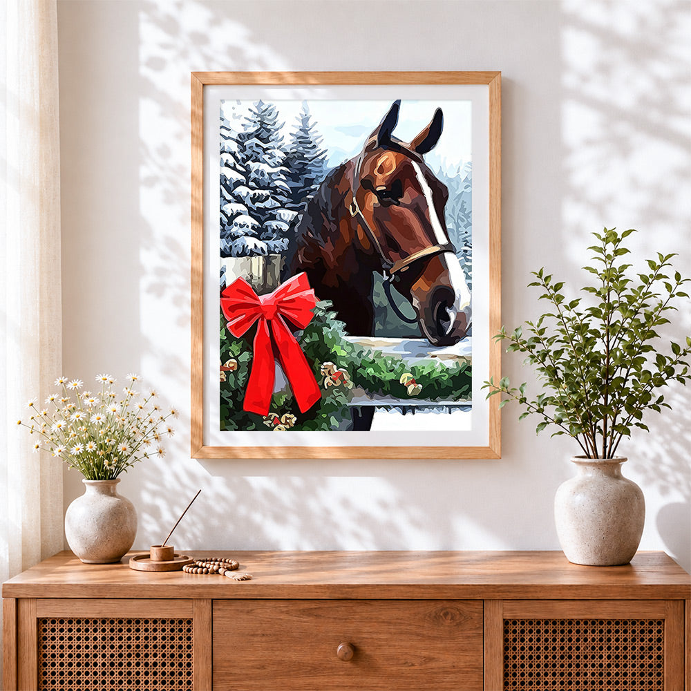 Finished horse with a red bow in the snow paint by numbers artwork displayed as home decor