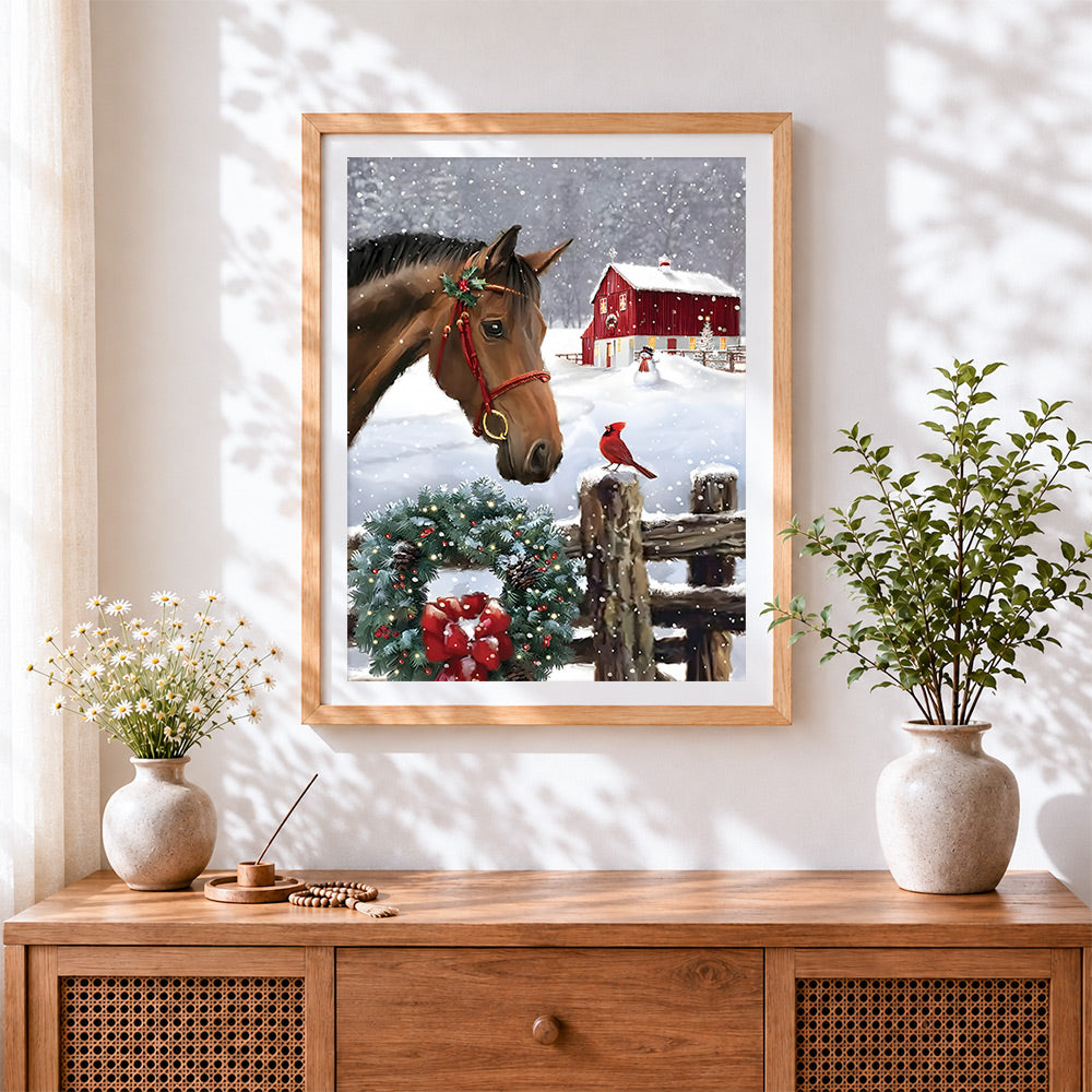 Finished horse with red cardinal and christmas wreath cross stitch artwork displayed