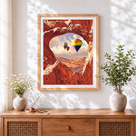 Finished hot air balloons through a heart cave cross stitch artwork displayed