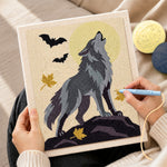 Creating handmade howling wolf under full moon punch needle artwork