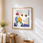 Humorous bulldog on toilet cross stitch artwork displayed on wall as home decor