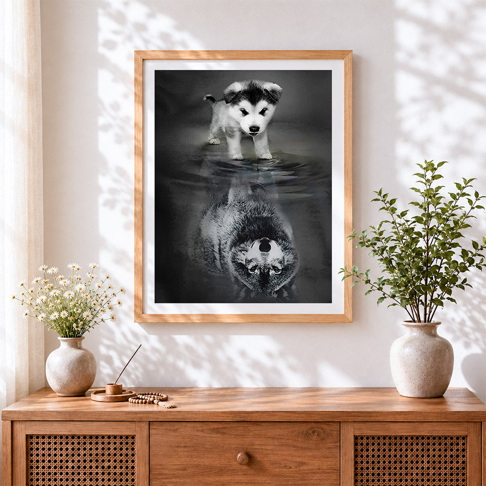 Finished husky puppy water reflection cross stitch artwork displayed