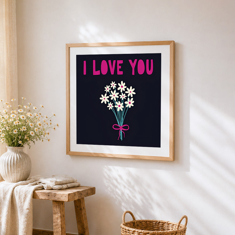 I love you and daisies cross stitch artwork displayed on wall as home decor