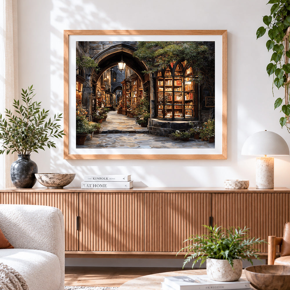 Finished illuminated bookshop archway cross stitch artwork displayed