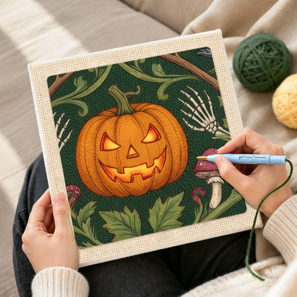 Creating handmade illuminated halloween pumpkin punch needle artwork