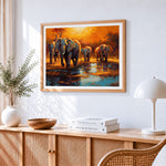 Impressionist elephant herd at waterhole cross stitch artwork displayed on wall as home decor