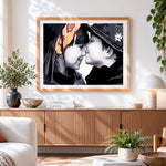 Finished innocent childhood kiss cross stitch artwork displayed