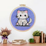 Finished innocent little kitten artwork displayed on a wall