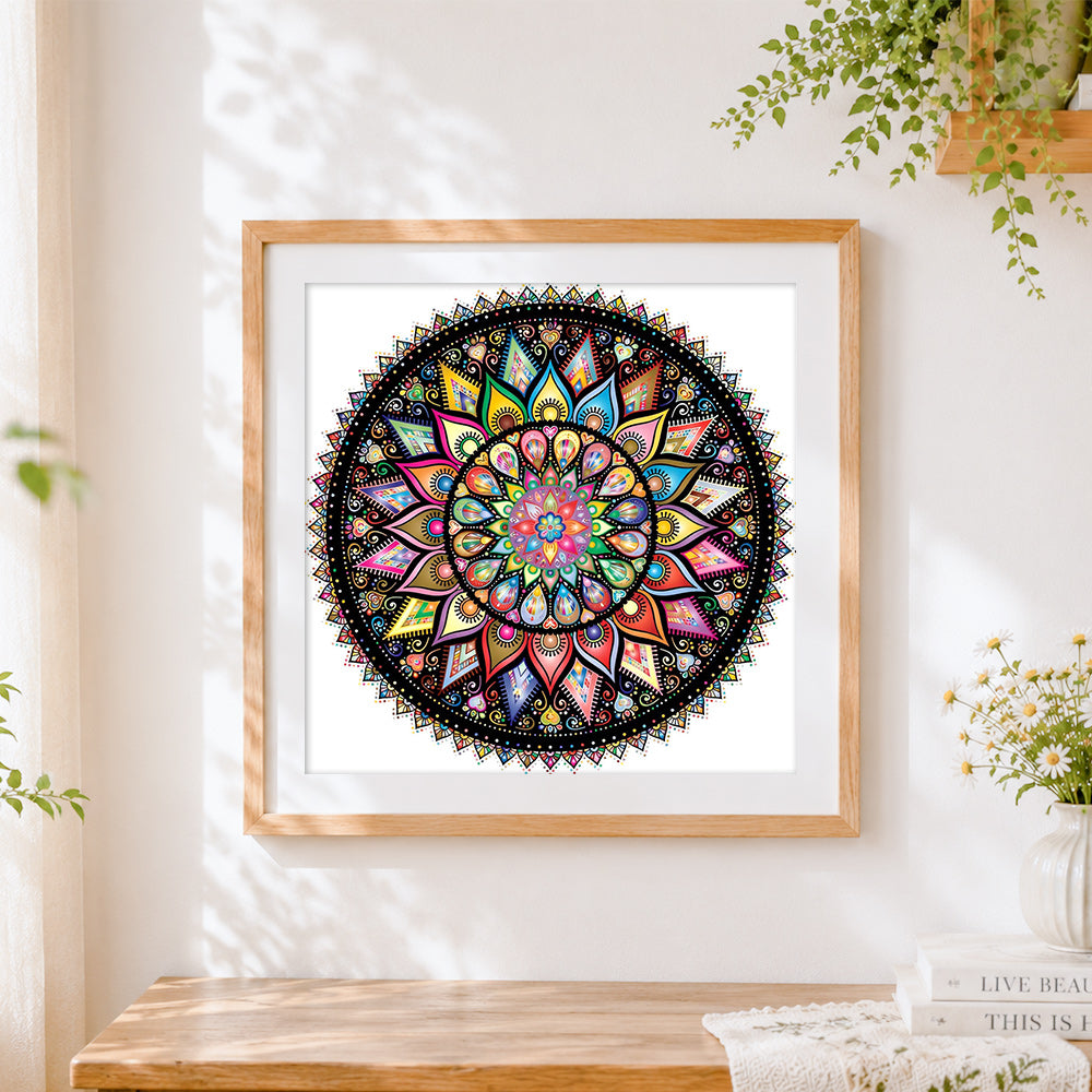 Finished intricate colourful mandala cross stitch artwork displayed