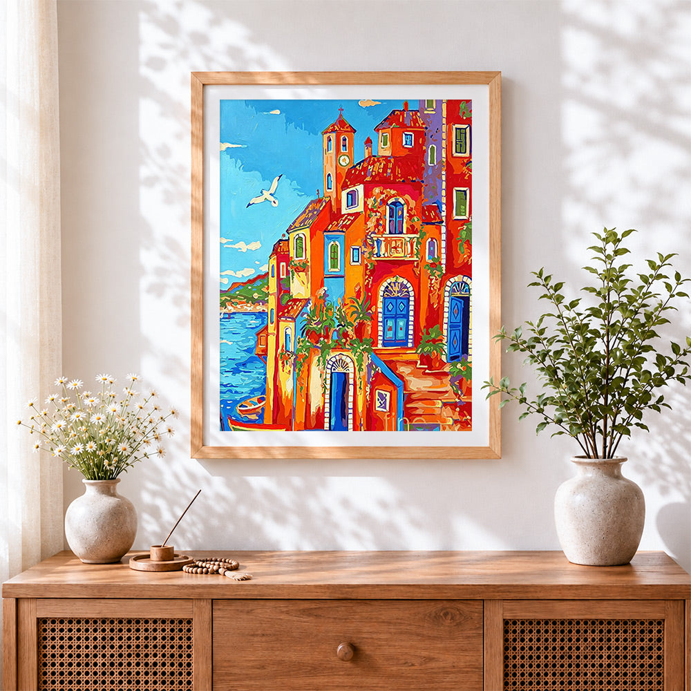 Finished italian coastal village cross stitch artwork displayed