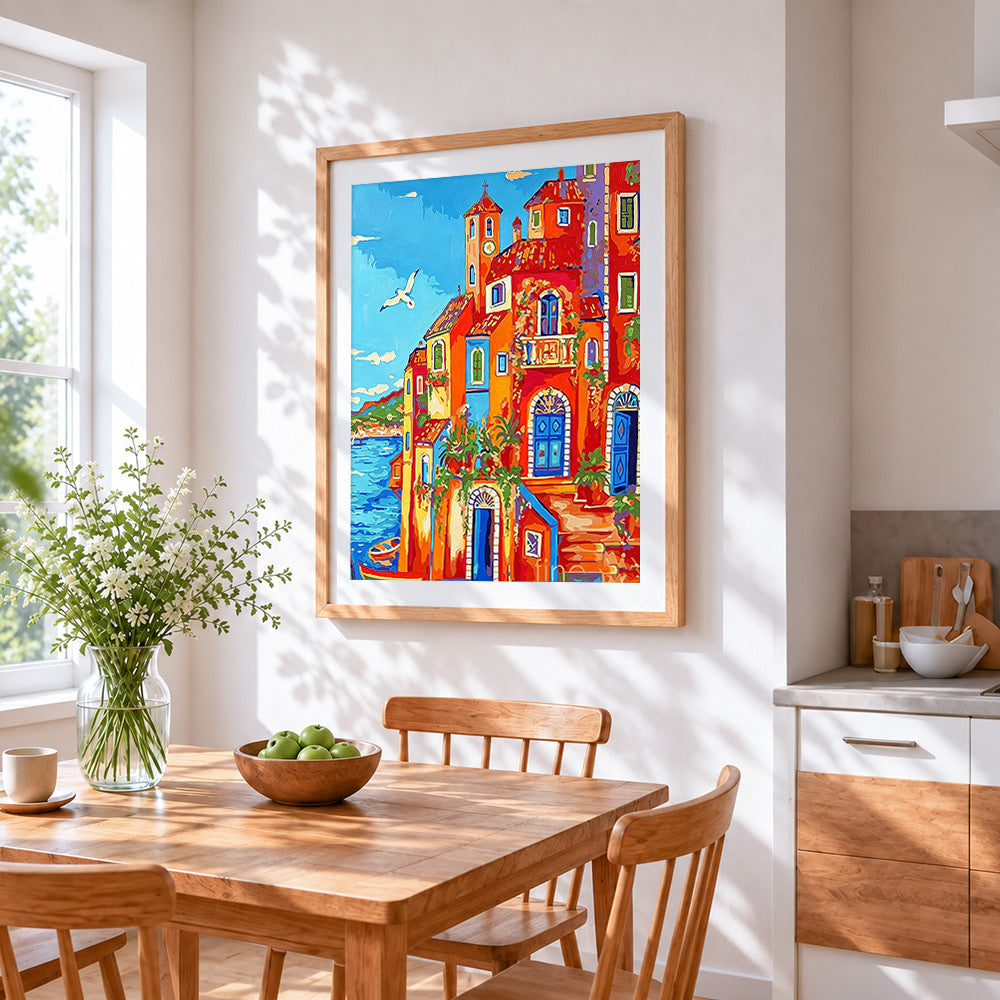 Italian coastal village cross stitch artwork displayed on wall as home decor