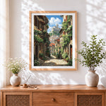 Finished italian hilltop village cross stitch artwork displayed