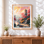 Finished japanese pagoda and autumn leaves cross stitch artwork displayed