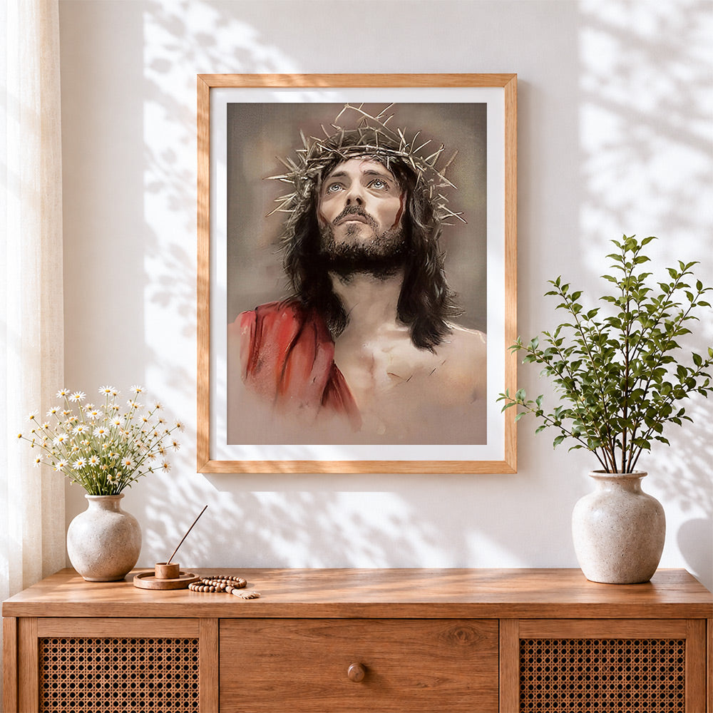 Finished jesus with crown of thorns cross stitch artwork displayed