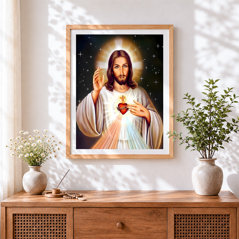 Finished jesus with red heart in the dark cross stitch artwork displayed