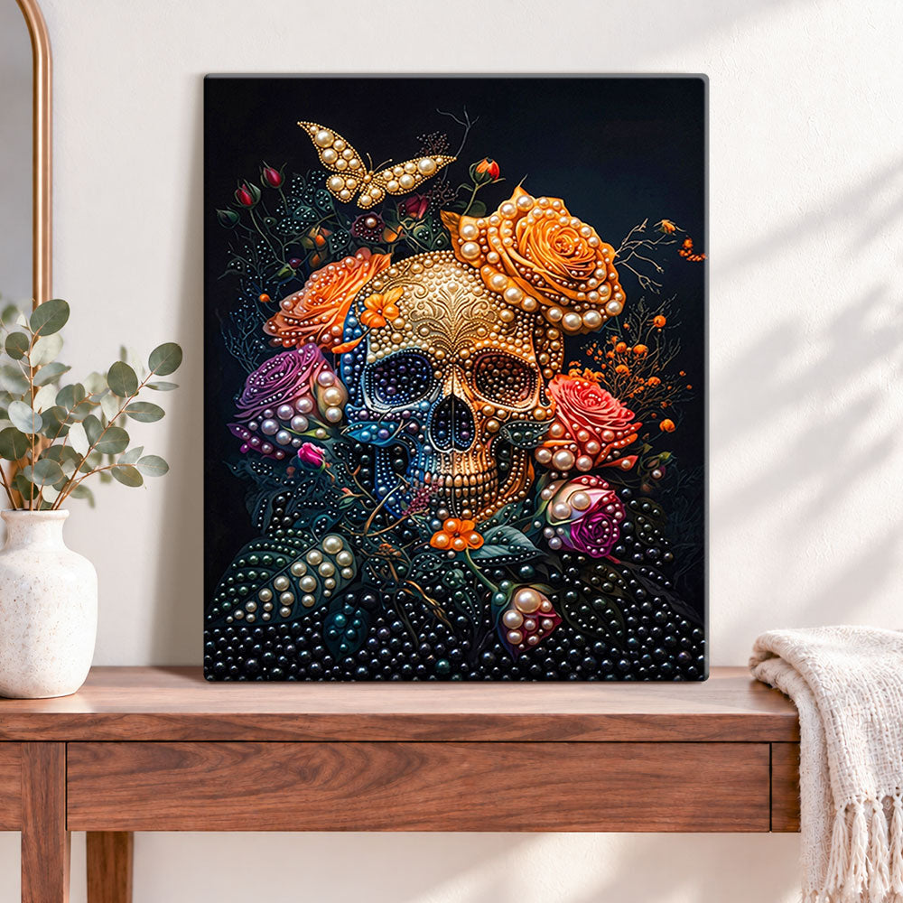 Finished jeweled floral skull pearl diamond painting artwork displayed as home decor