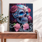 Finished jeweled skull and roses pearl diamond painting artwork displayed as home decor