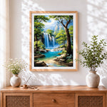 Finished jungle waterfall and blue lagoon cross stitch artwork displayed