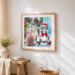 Kitten and duckling with pinecone cross stitch artwork displayed on wall as home decor