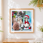 Finished kitten and duckling with pinecone paint by numbers artwork displayed as home decor