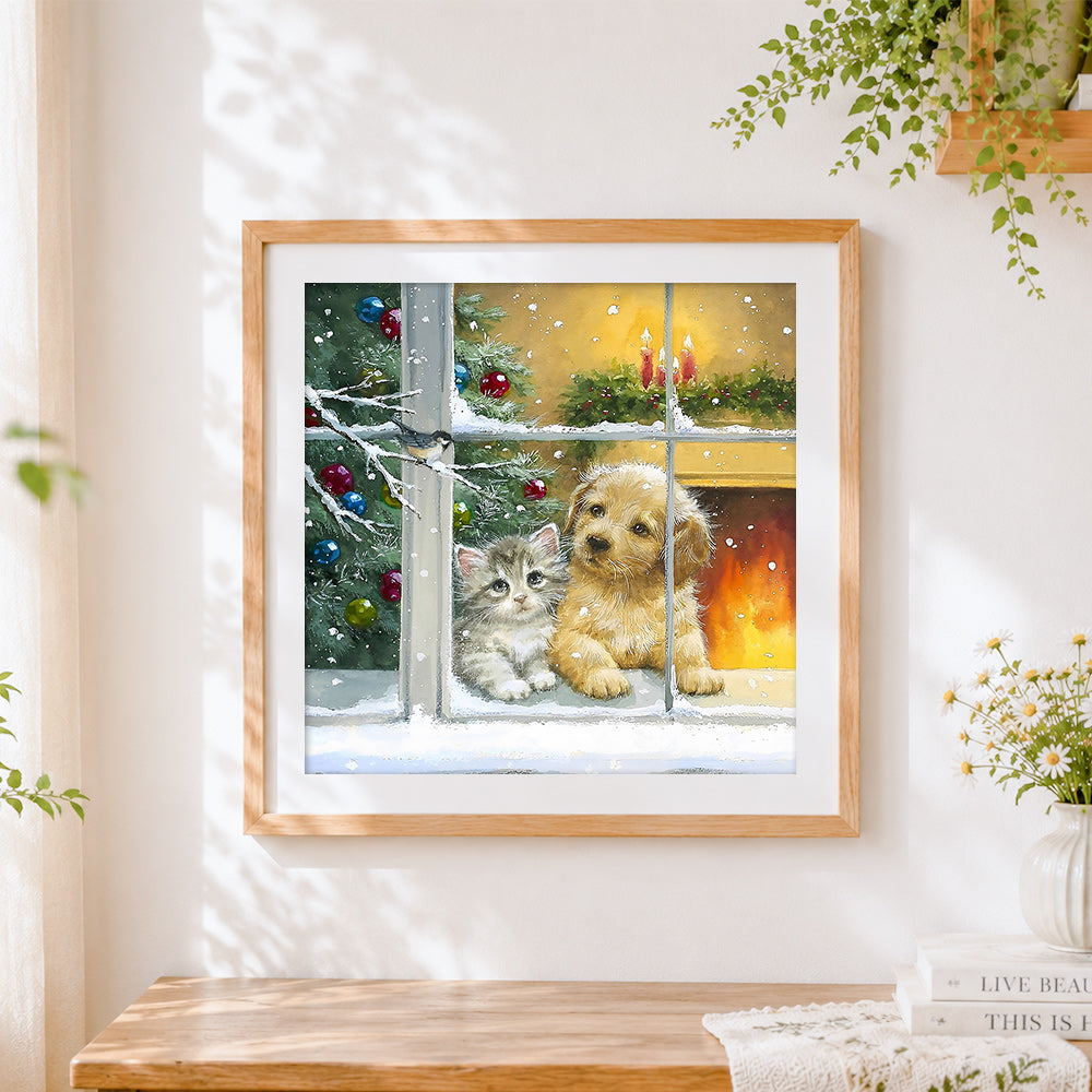 Finished kitten and puppy on a snowy windowsill cross stitch artwork displayed