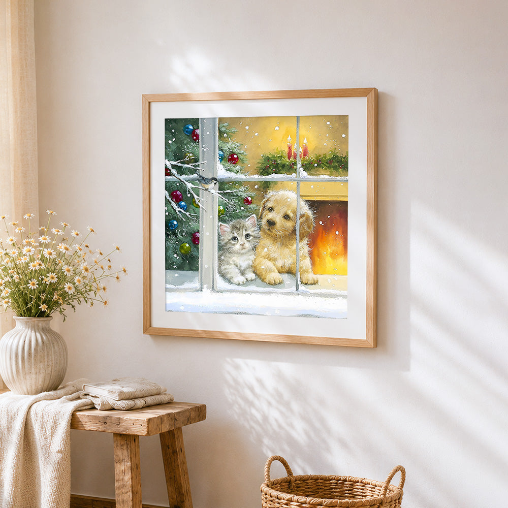 Kitten and puppy on a snowy windowsill cross stitch artwork displayed on wall as home decor