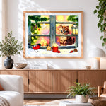 Finished kitten in a snowy window with robin cross stitch artwork displayed