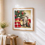 Kitten playing with christmas bauble cross stitch artwork displayed on wall as home decor