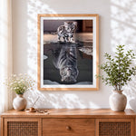 Finished kitten with tiger reflection cross stitch artwork displayed