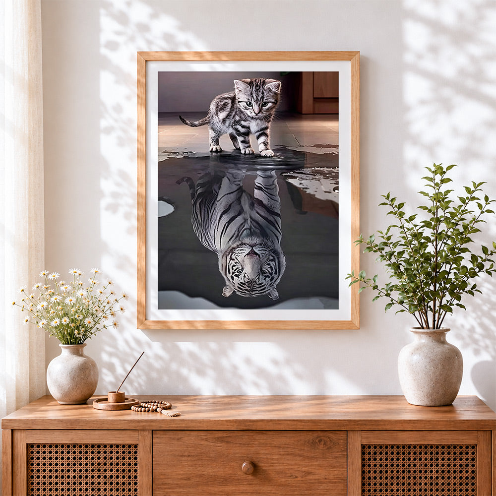Finished kitten with tiger reflection cross stitch artwork displayed