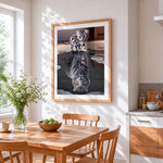 Kitten with tiger reflection cross stitch artwork displayed on wall as home decor