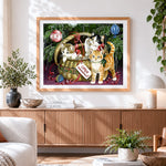 Finished kittens in a basket by the christmas tree cross stitch artwork displayed