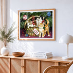 Kittens in a basket by the christmas tree cross stitch artwork displayed on wall as home decor
