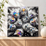 Finished kittens with rainbow sparkling eyes pearl diamond painting artwork displayed as holiday home decor