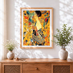 Finished klimt style floral portrait cross stitch artwork displayed