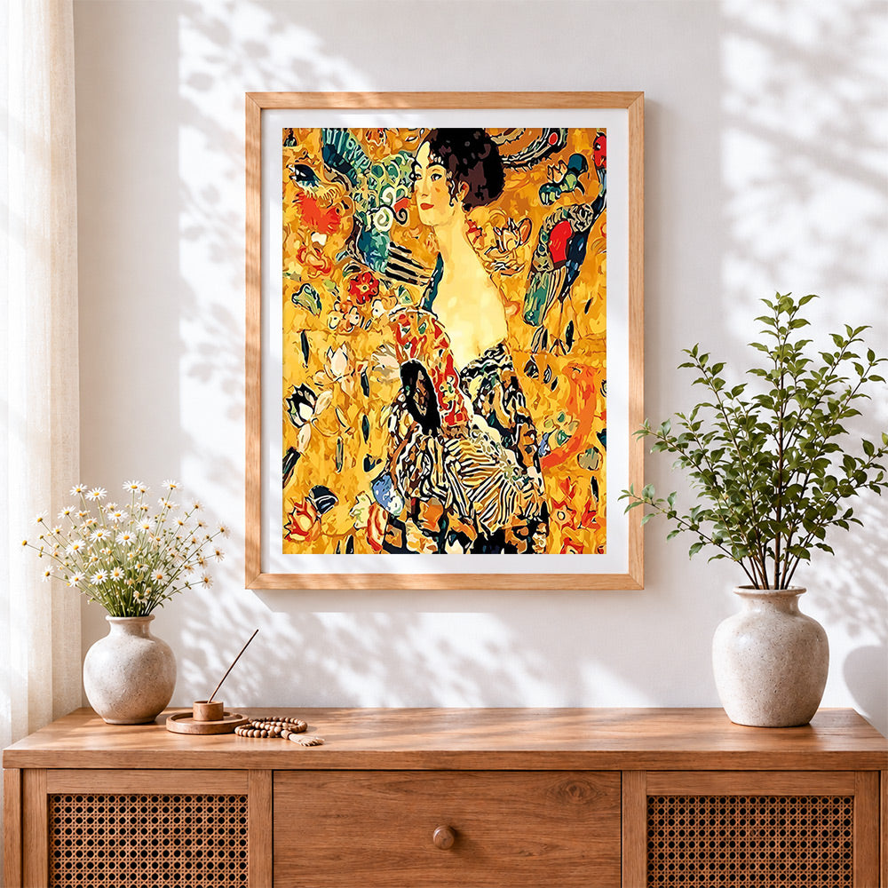 Finished klimt style floral portrait cross stitch artwork displayed