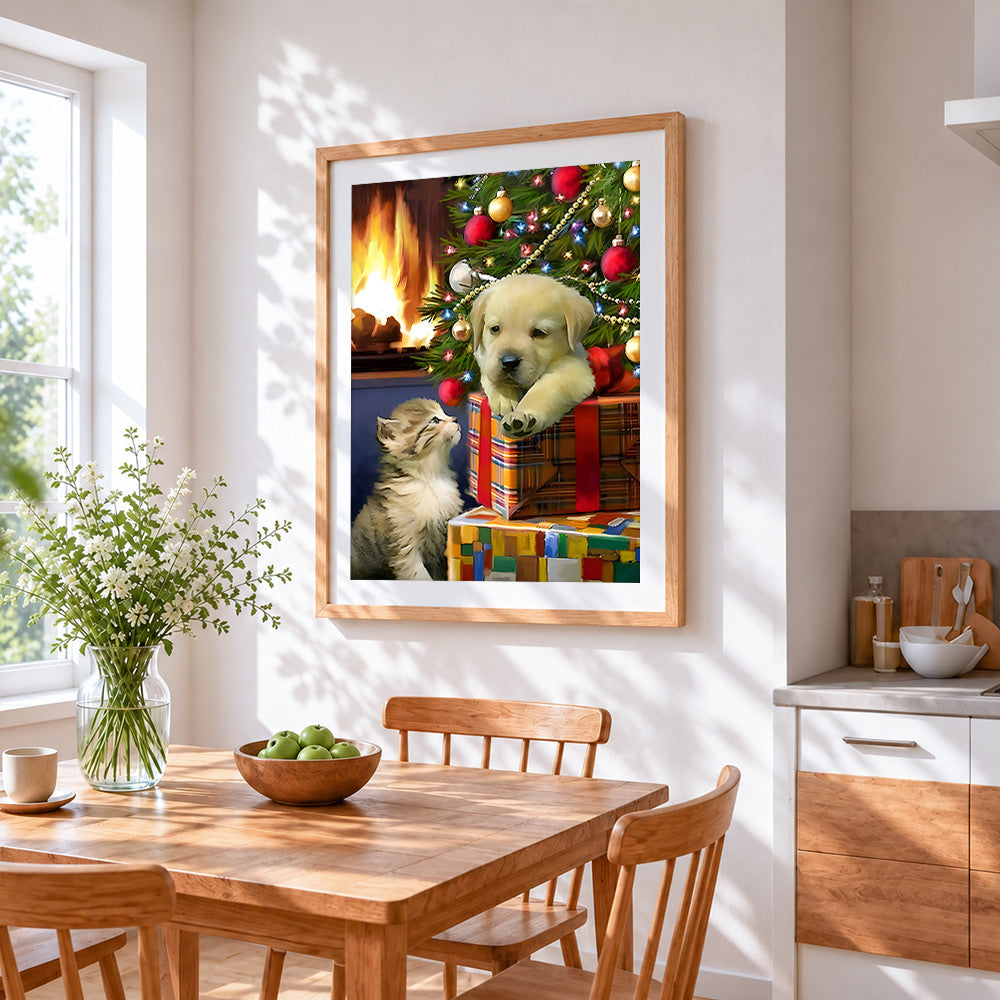 Labrador puppy and kitten on christmas presents cross stitch artwork displayed on wall as home decor