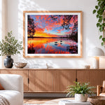 Finished lake at sunset cross stitch artwork displayed