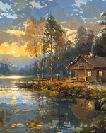 Lakeside log cabin at sunset cross stitch kit for beginners