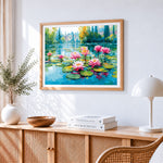 Lakeside water lilies and distant houses cross stitch artwork displayed on wall as home decor